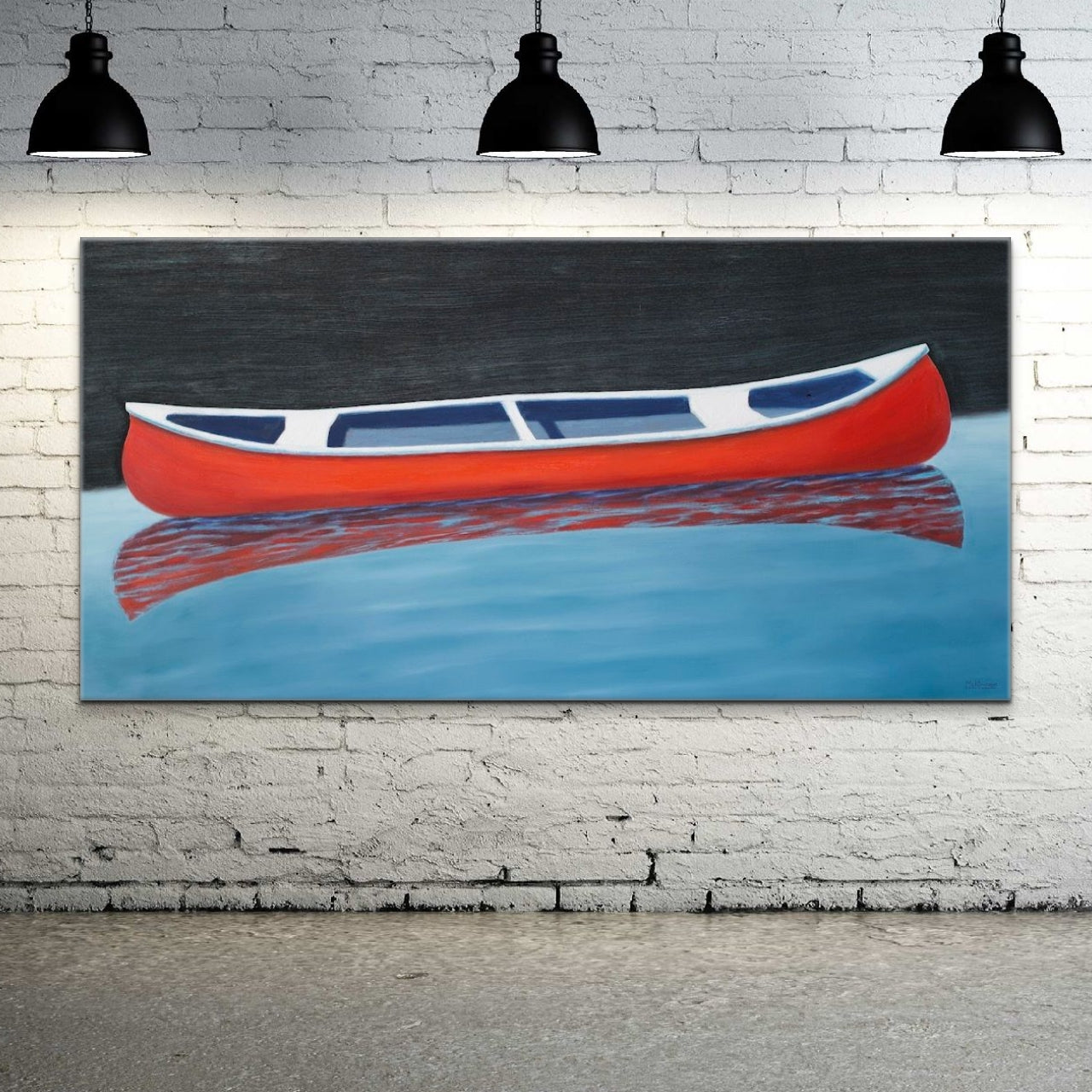 A painting of a red canoe by Canadian artist Catherine McKinnon. The small red boat is floating on almost still blue water in the foreground and the background is pitch black. The giclee print is frameless. It is mounted on a white brick wall below three stylish, contemporary black hanging lights.