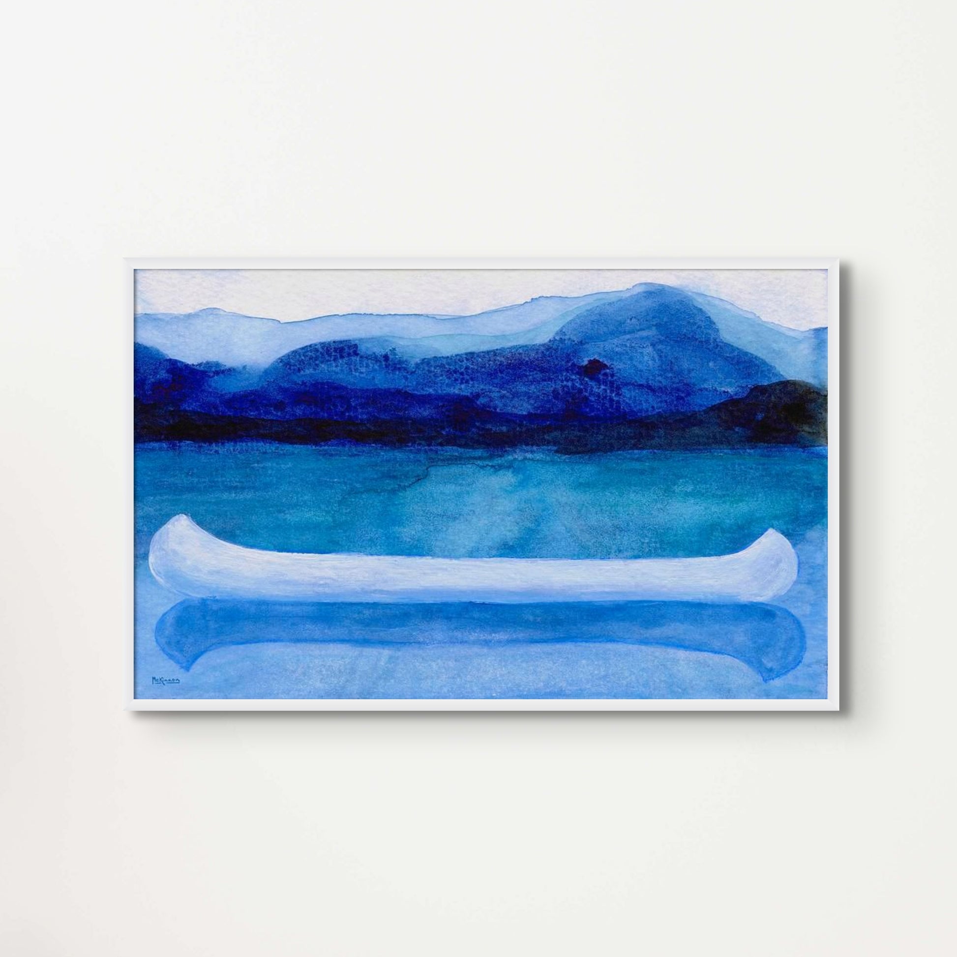 A work of canoeing art by Canadian artist Catherine McKinnon. The watercolor depicts a small white boat, a "canoe", on blue water with a dark blue distant shore and lighter blue distant moutains. The giclee print is framed in white and is mounted on a light gray wall.
